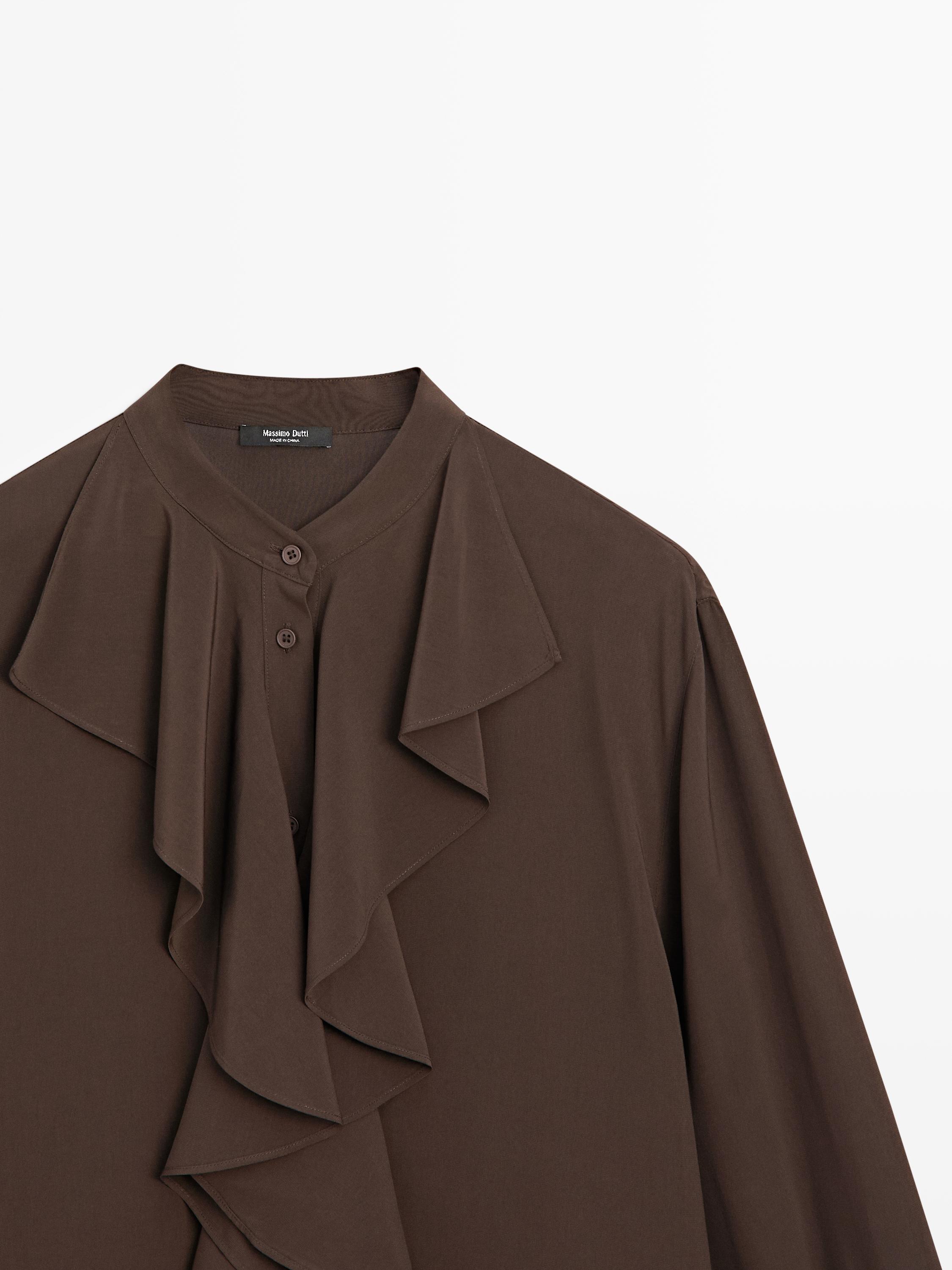 Flowing blouse with ruffles